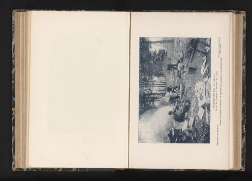 Four men making planks from tree trunks