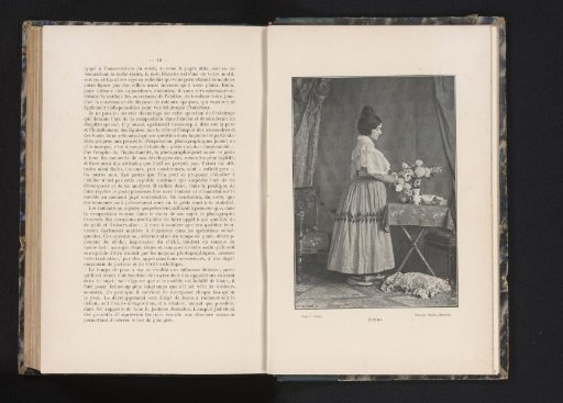 Woman Next to a Table with Flowers