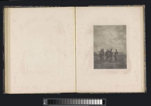 Two men and a horse plow in a field