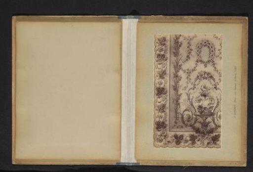 Photographic reproduction of a decorative pattern with flowers and architectural fragments