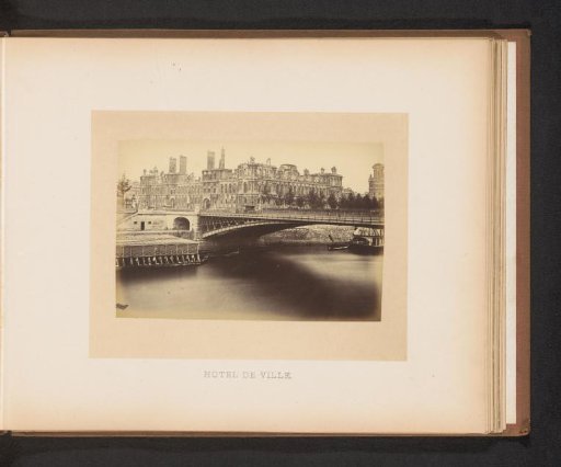 View of the destroyed Hôtel de Ville in Paris from the other side of the Seine