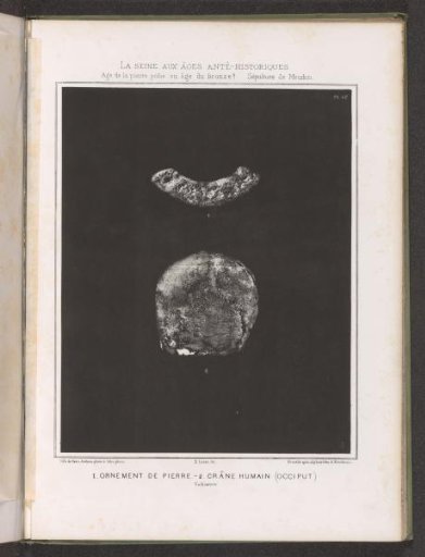 Ornamental stone and occiput of a human skull