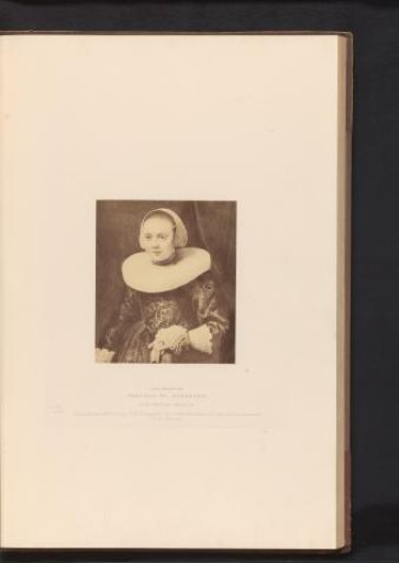 Photographic reproduction of the portrait of a woman with gloves in her hand by Rembrandt van Rijn