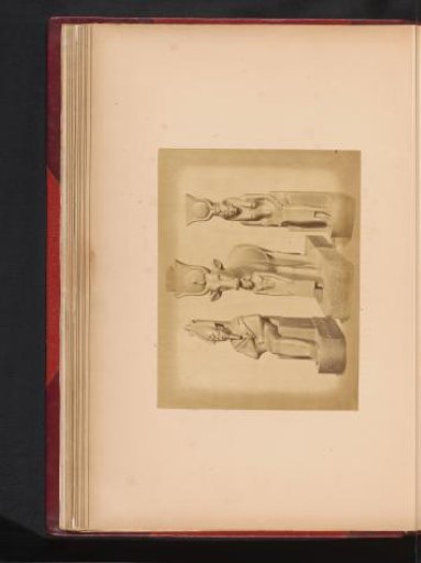 Statues of Osiris, Isis and another Egyptian god in the Boulaq Museum in Cairo, Egypt