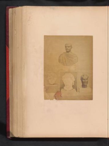 Bust and three sculpted heads in Greek and Roman style in the Boulaq Museum in Cairo, Egypt