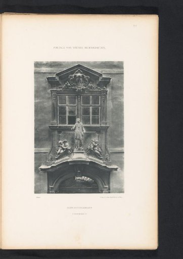Sculptures above the entrance portal of the Altes Michaelerhaus in Vienna