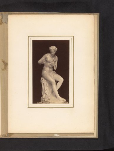 Sculpture of a woman with a dove by Leopold Borbone