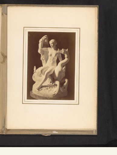 Sculpture of a woman and a dragon by Leopold Borbone