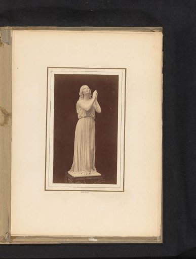 Sculpture of a praying woman by Leopold Borbone