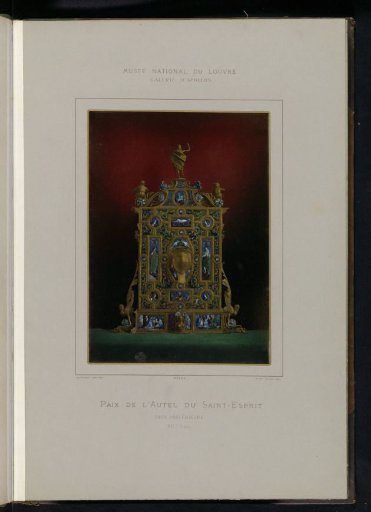Back of a golden altarpiece decorated with images of religious figures and Christ with a cross on top