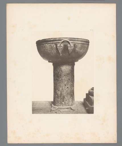 Font with holy water in San Marco in Venice