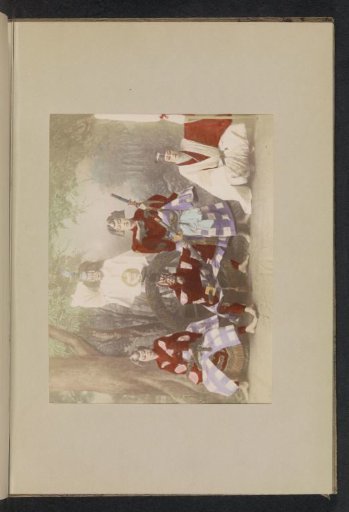 Group portrait of five costumed actors