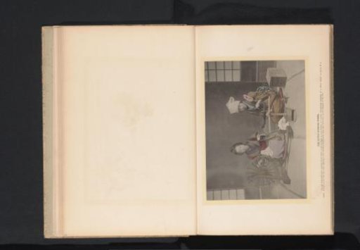 Two women working with a spinning wheel