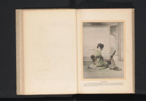 A woman fastening her hair