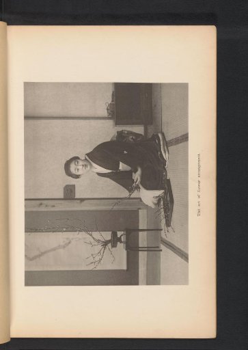 Unknown Japanese woman arranging flowers