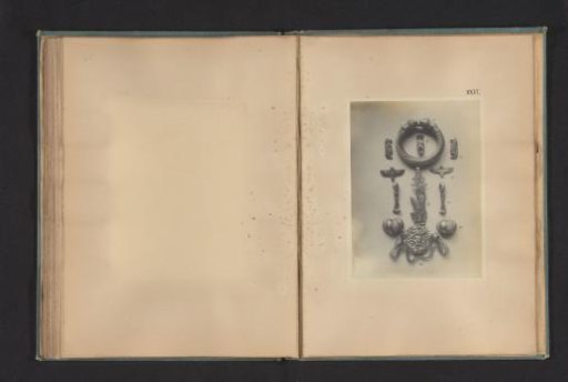 Twelve Egyptian jewelry pieces, including amulets of Bes and Taweret