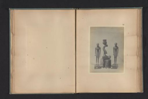 Five Egyptian objects, including two sculptures of boys and a wooden kohlpot with the image of Bes