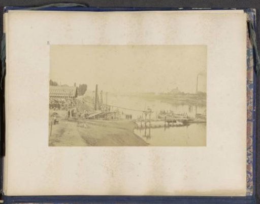 View of a wooden structure for the construction of the Viaduc d'Auteuil over the Seine at Point-du-Jour
