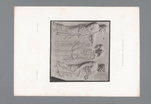 Part of the frieze of the Parthenon in Athens, depicting two men and two women