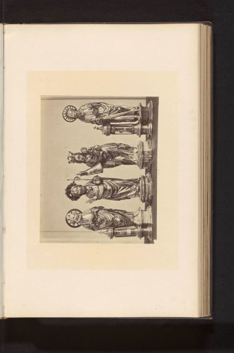 Four reliquaries in the form of sculptures from the Basilica of Our Lady in Tongeren, displayed at an exhibition of religious objects from the Middle Ages and Renaissance in 1864 in Mechelen