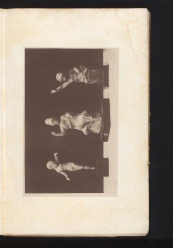 Three terracotta sculptures of a dancer, a seated woman, and a warrior