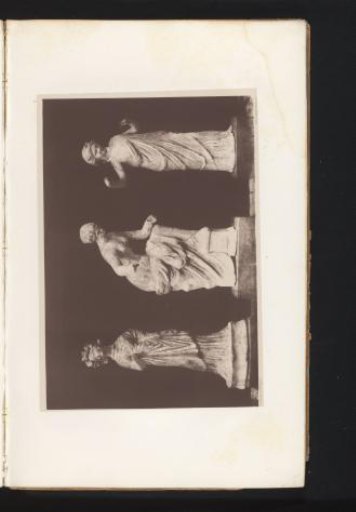 Three terracotta sculptures of two women and a priestess of Bacchus