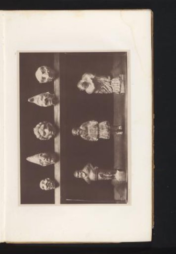 Eight terracotta sculptures, consisting of five grotesque heads, two men, and a grotesque doll