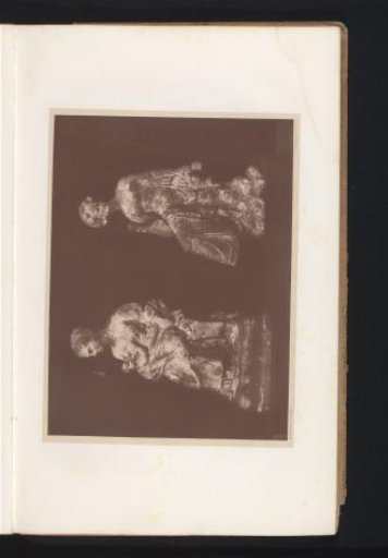 Two terracotta sculptures of seated women