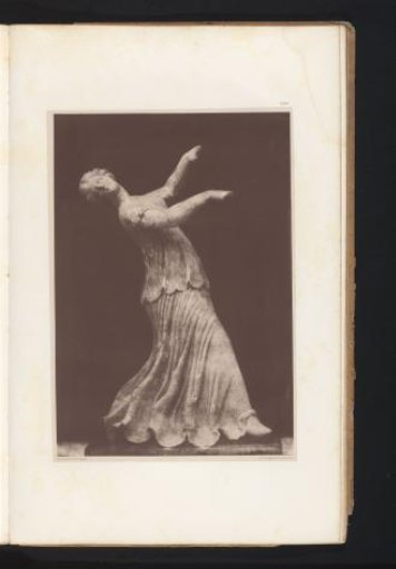 Terracotta sculpture of a dancing woman