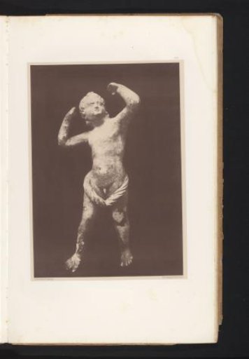 Terracotta sculpture of a jumping child