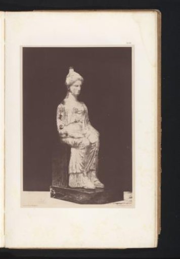 Terracotta sculpture of a seated Venus