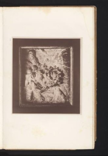 Terracotta plaque with a relief of the head of a satyr