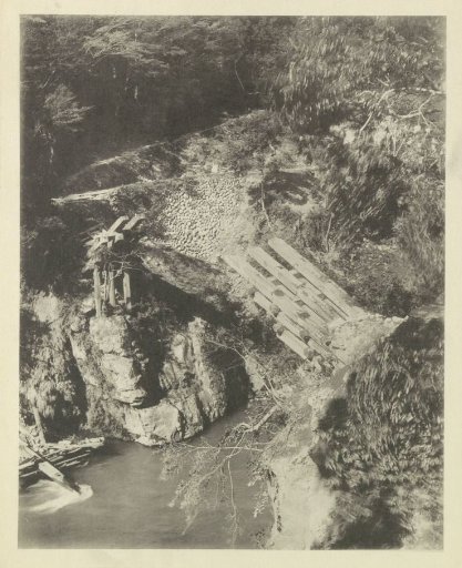 View of a destroyed bridge in the Neo Valley in Japan after an earthquake