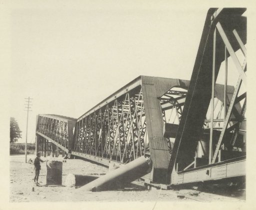 Collapsed railway bridge over the Nagara River in Japan after an earthquake