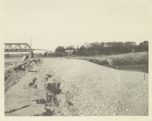 View of a collapsed railway bridge over the Nagara River in Japan after an earthquake