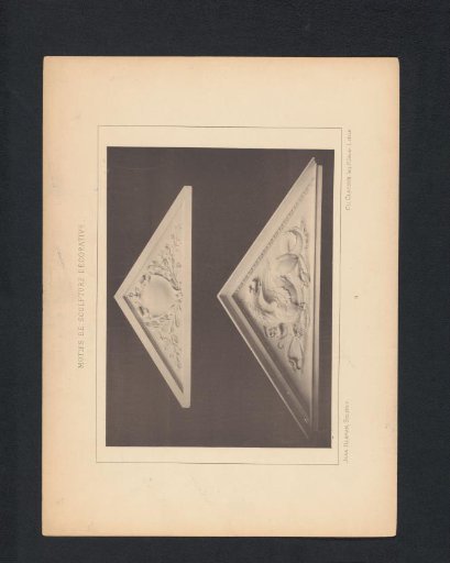 Two triangular reliefs with branches and a dragon, sculpted by Jean Herman