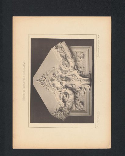 Relief with leafy scrolls and a face, sculpted by Jean Herman