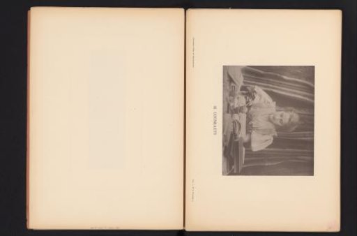 Woman sitting at a table writing