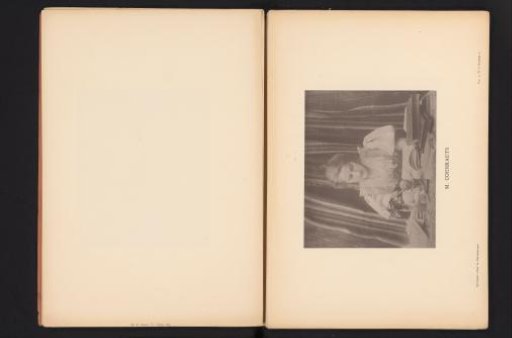 Woman sitting at a table writing