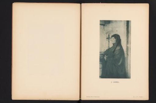 Portrait of an unknown woman with a cap on her head, with a crucifix in the background