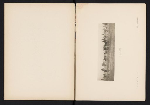 Group of people watching sailing ships at sea from the beach