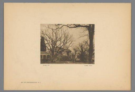 View of a Garden with Trees, with a Building Featuring a Clock Tower in the Background