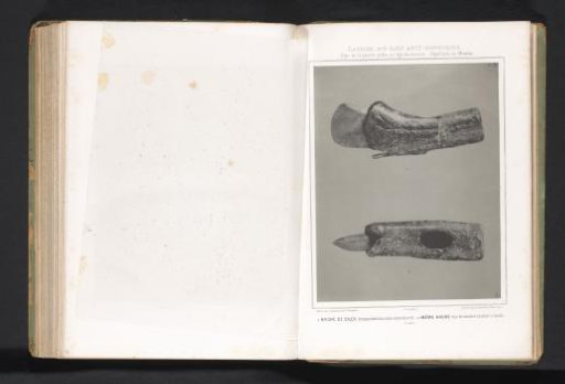 Two views of a flint axe set in stag's horn
