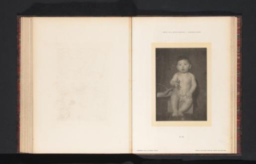 Seated nude boy