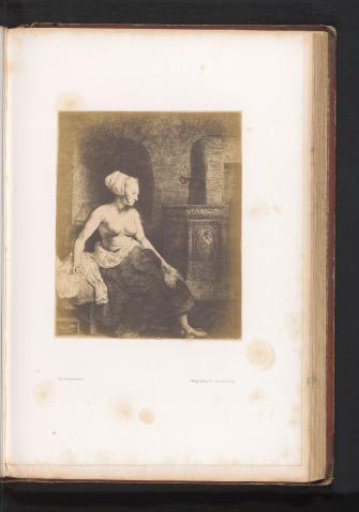 Photographic Reproduction of an Etching of a Woman with an Exposed Upper Body by a Stove by Rembrandt van Rijn