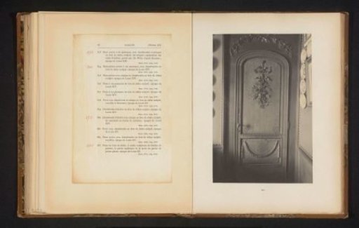 Decorated wooden door in the house of Antonin Terme