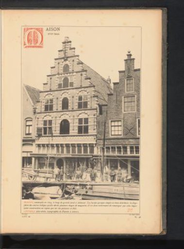 House in Alkmaar, with men and children on a quay in the foreground