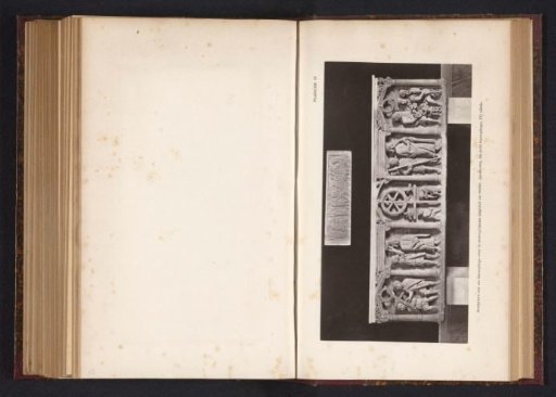 Relief on a fourth-century sarcophagus with the Christ monogram and a small sarcophagus