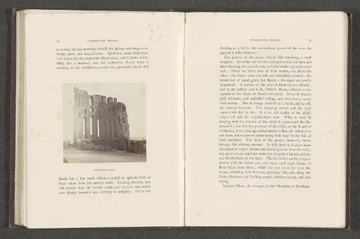 View of the ruin of Whitby Abbey with cannonballs in front