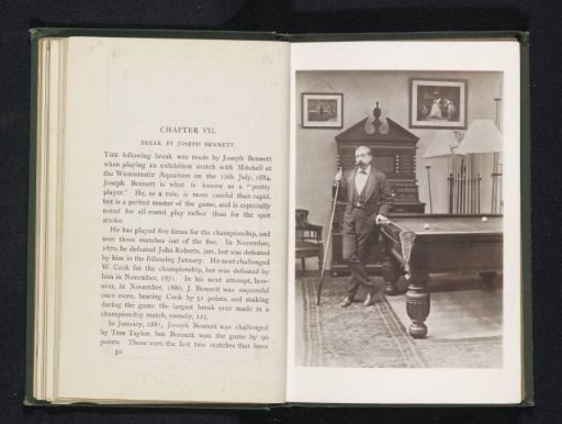 Man with a Cue in His Hand Next to a Billiard Table
